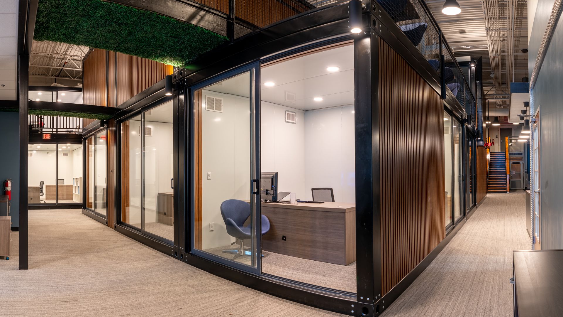 2 vintage cars in a driveway